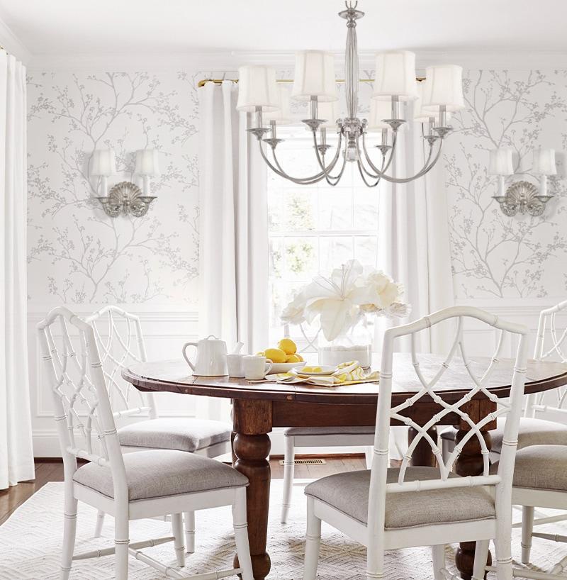 Bright and airy traditional dining room with modern chandelier