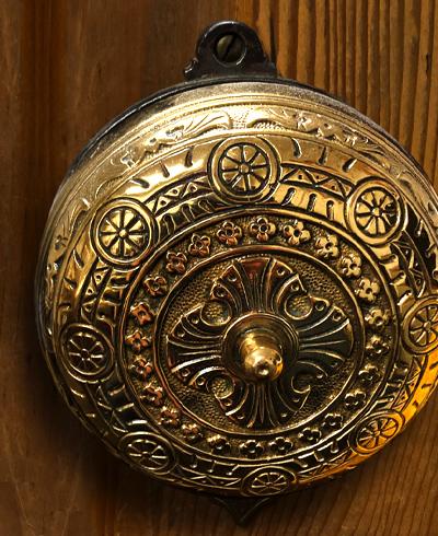 The interior side of this 1870s mechanical door bell shows the fine quality of the bronze casting. 