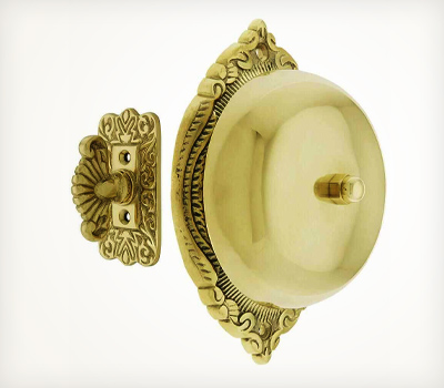 Polished brass hand-turn doorbell