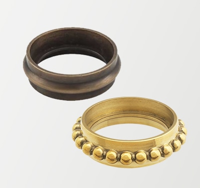 Brass trim rings add a decorative flourish to stem & plate casters