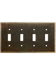 Forged Brass Quad Toggle Switch Plate in Aged Antique Brass