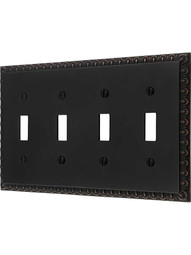 Ovolo Quad Gang Toggle Switch Plate in Timeless Bronze