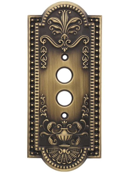 Como Single Push-Button Switch Plate in Antique Brass