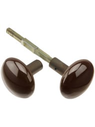 Pair of Brown Porcelain Doorknobs with Brass Shank in Antique Brass