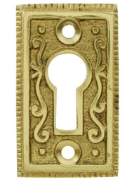 Solid Brass Ornate Key Escutcheon in Unlacquered Brass