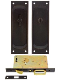 Privacy Pocket Door Mortise Lock Set With Rectangular Pulls in Medium Bronze