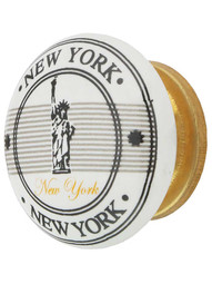 White Porcelain Statue of Liberty Souvenir Cabinet Knob with Brass Base in Un-Lacquered Brass