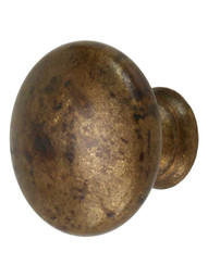 Classic Round Knob - 1 3/16" Diameter in Antique Brass Distressed