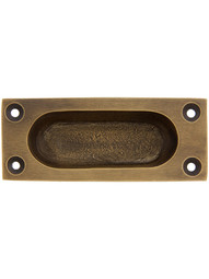 Cast Brass Flush Mount Sash Lift With Oval Inset In Antique Brass