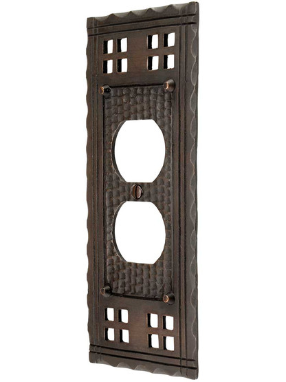 Arts and Crafts Duplex Outlet Cover Plate In Oil-Rubbed Bronze.