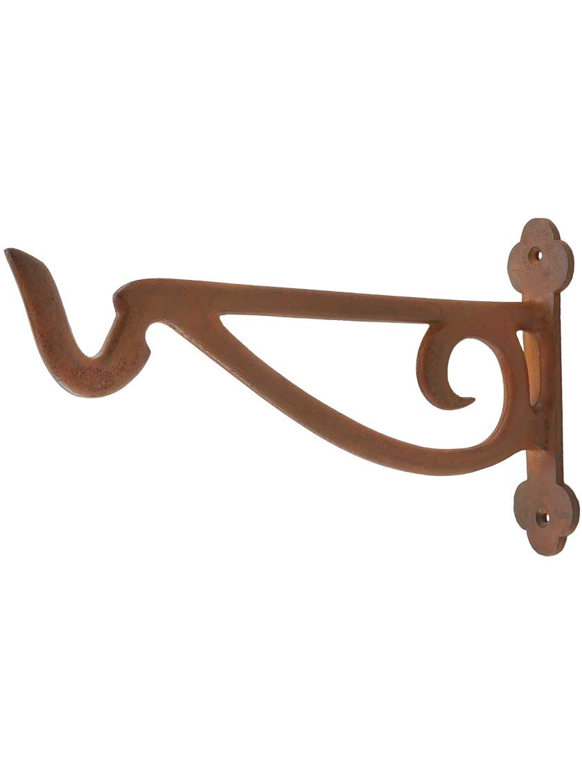 Cast-Iron Scroll Plant Hanger in Rust.