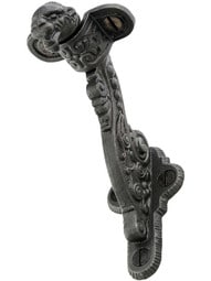 Lion Head Handrail Bracket in Lacquered Iron.