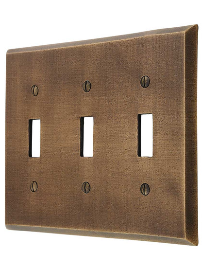 Distressed Bronze Triple-Toggle Switch Plate.
