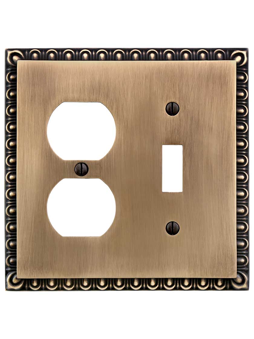 Alternate View of Ovolo Toggle/Duplex Combination Switch Plate in Antique-By-Hand.