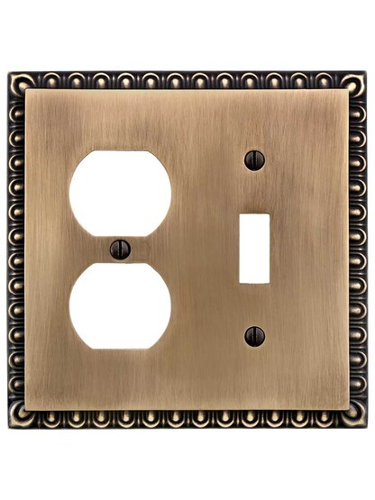 Alternate View of Ovolo Toggle/Duplex Combination Switch Plate in Antique-By-Hand.
