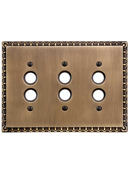 Alternate View of Ovolo Triple Gang Push-Button Switch Plate in Antique-By-Hand.