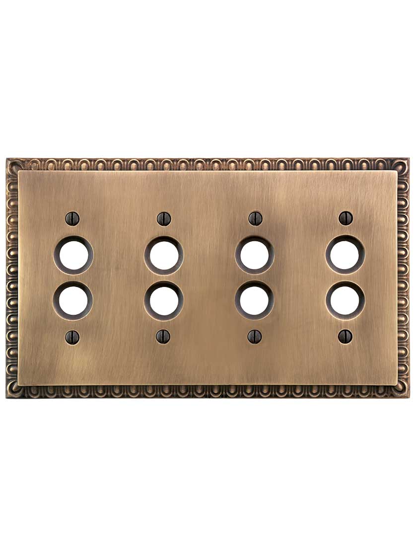 Alternate View of Ovolo Quad Gang Push-Button Switch Plate in Antique-By-Hand.