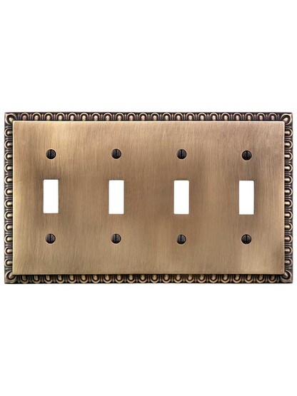 Alternate View of Ovolo Quad Gang Toggle Switch Plate in Antique-By-Hand.