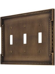 Neoclassical Triple Gang Toggle Switch Plate in Antique-By-Hand.