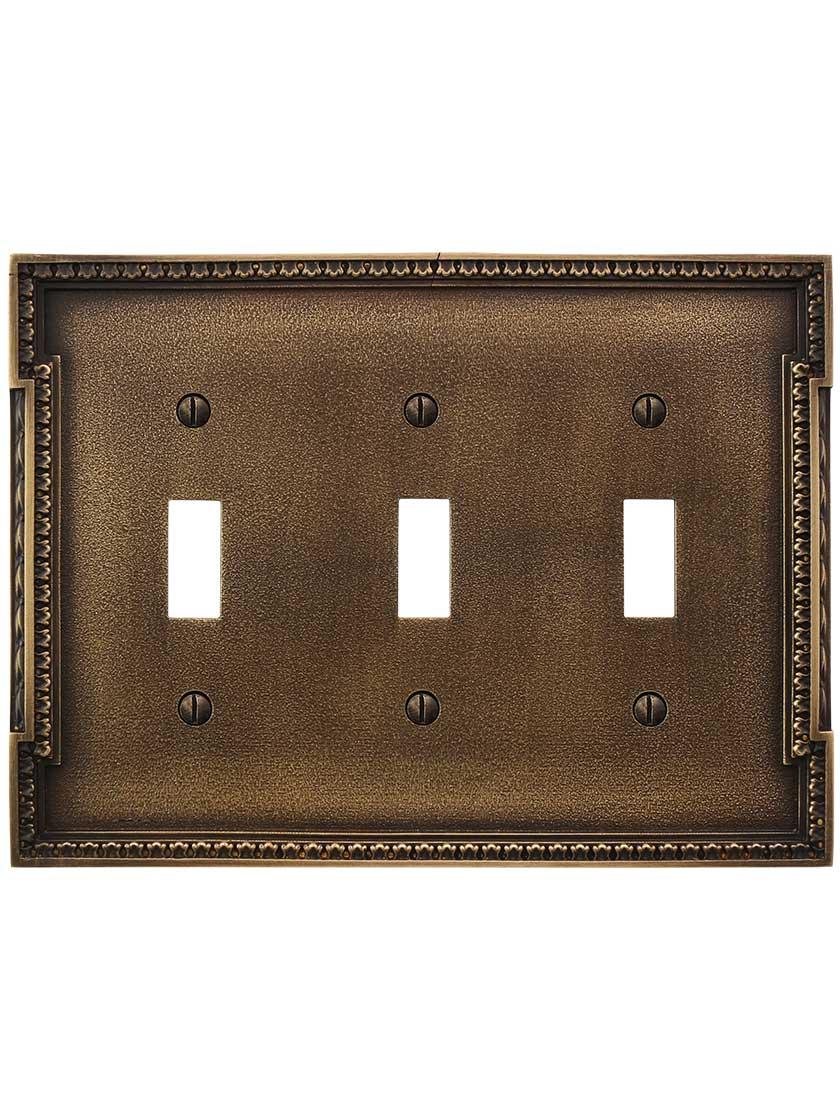 Alternate View of Neoclassical Triple Gang Toggle Switch Plate in Antique-By-Hand.