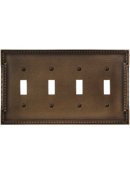 Alternate View of Neoclassical Quad Gang Toggle Switch Plate in Antique-By-Hand.
