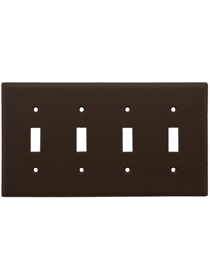 Leviton Quad Toggle Cover Plate in Brown.
