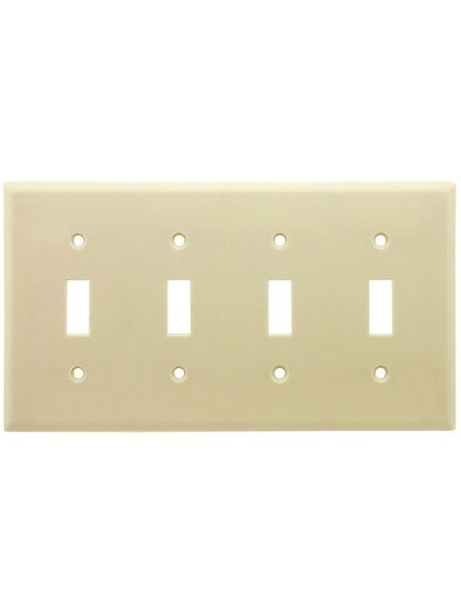 Leviton Quad Toggle Cover Plate in Ivory.