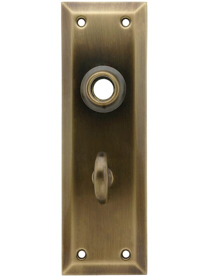Stamped Brass New York Back Plate With Thumb Turn In Antique-By-Hand Finish.