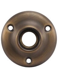 Traditional Stamped Brass Rosette in Antique-by-Hand - 2 inch Diameter.