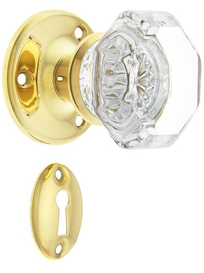 Brass Rosette Mortise Lock Set with Octagonal Glass Knobs in Unlacquered Brass.