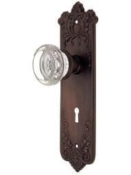 Wrought Bronze Lorraine Mortise Door Set With Round Glass Door Knobs.