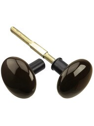 Pair of Brown Porcelain Rim Lock Knobs With Black Iron Shanks