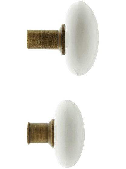 Pair of White Porcelain Rim Lock Knobs With Solid Brass Shanks