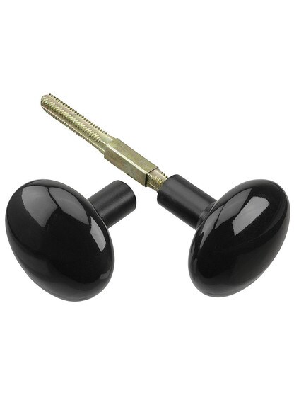 Pair of Black Porcelain Door Knobs With Black Iron Shanks.