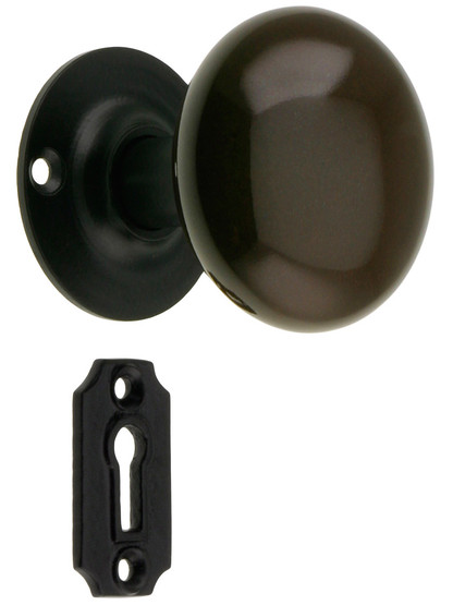 Pair of Brown Porcelain Door Knobs With Black Iron Shanks