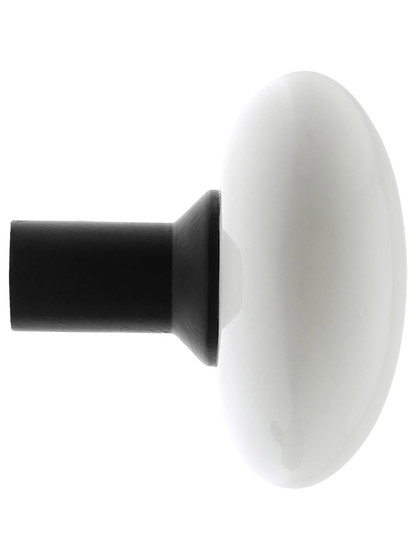 Pair of White Porcelain Door Knobs With Black Iron Shanks