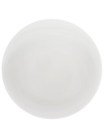 Alternate View of Pair of White Porcelain Doorknobs with Brass Shanks.