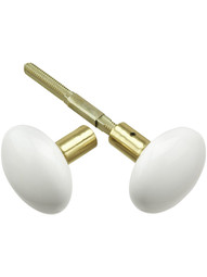 Pair of White Porcelain Doorknobs with Brass Shanks.