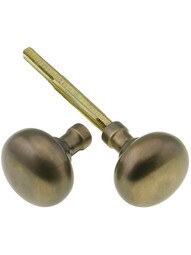 Pair of Small Colonial Door Knobs In Unlacquered Cast Brass