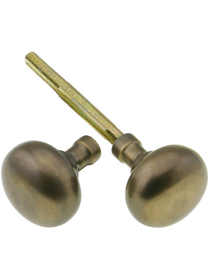 Pair of Small Colonial Door Knobs In Antique-By-Hand Finish.