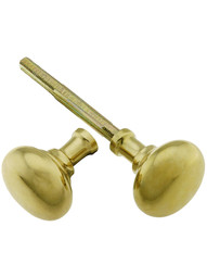 Pair of Small Colonial Door Knobs In Unlacquered Cast Brass