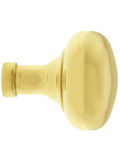 Pair of Small Colonial Door Knobs In Unlacquered Cast Brass