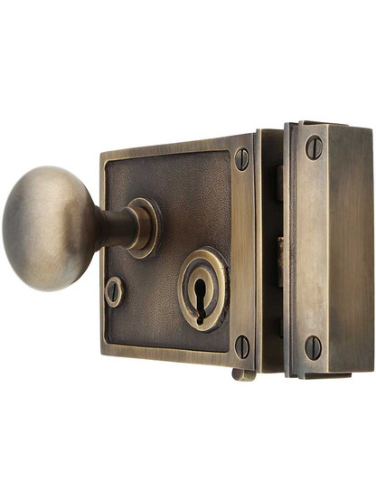 Alternate View of Solid Brass Horizontal Rim Lock Set with Small Round Knobs In Antique-By-Hand Finish.