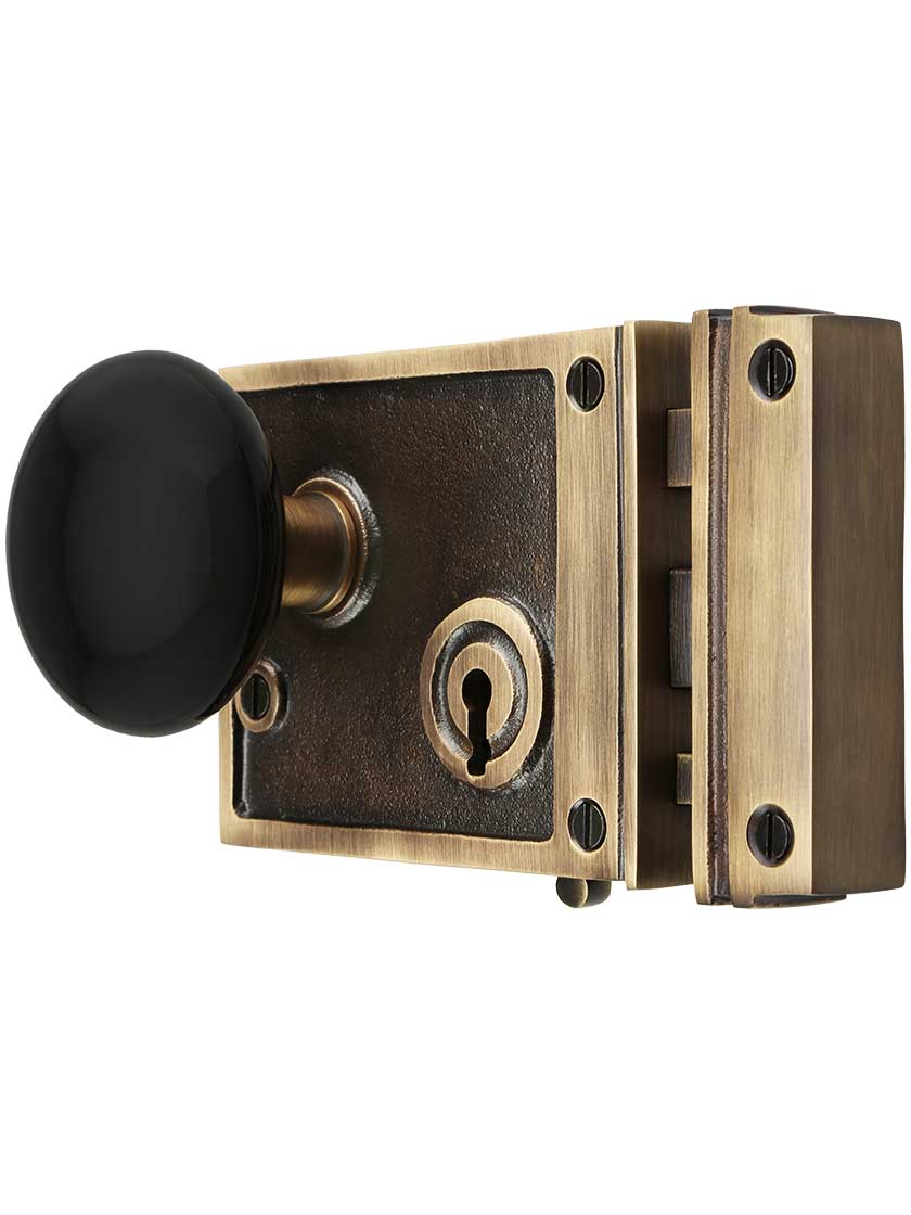 Alternate View of Solid Brass Horizontal Rim Lock Set with Black Porcelain Door Knobs.
