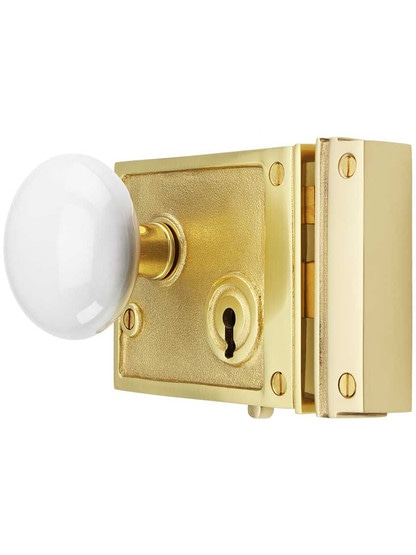 Alternate View of Solid Brass Horizontal Rim Lock Set with White Porcelain Knobs.