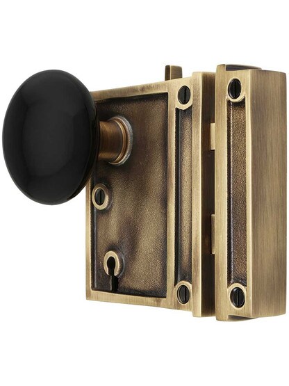 Alternate View of Solid Brass Vertical Rim Lock Set with Black Porcelain Door Knobs.