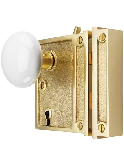 Alternate View of Solid Brass Vertical Rim Lock Set with White Porcelain Knobs.