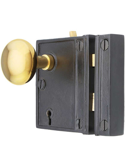 Alternate View of Cast Iron Vertical Rim Lock Set with Small Brass Knobs.