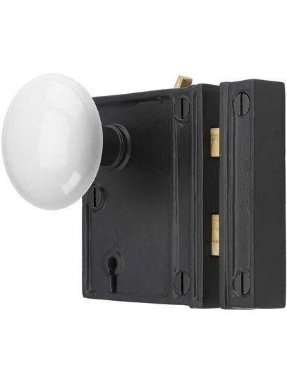 Alternate View of Cast Iron Vertical Rim Lock Set with White Porcelain Door Knobs.