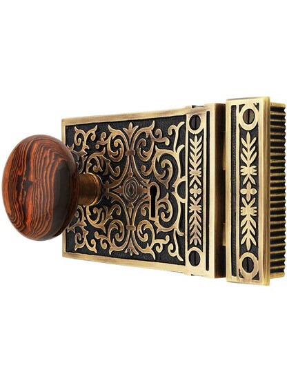 Alternate View of Solid Brass Scroll Rim Lock Set with Brown Swirl Porcelain Knobs.